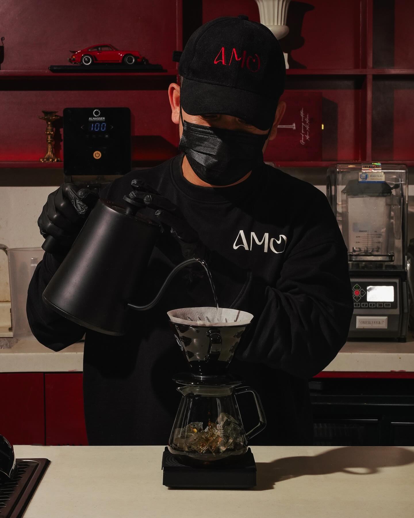 Barista pouring V60