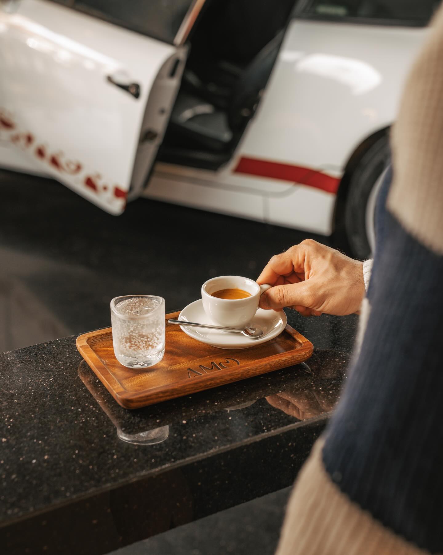 Espresso on a wooden AMO tray